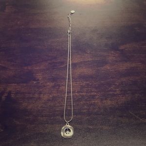 SMALL SILVER PEACE SIGN NECKLACE